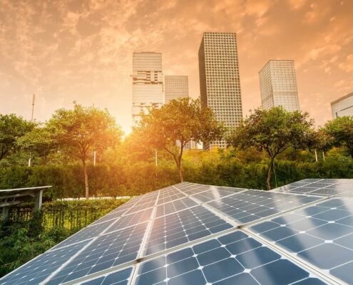 Solar panels in a sunrise.