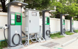 Grey and green EV charging stations in lot
